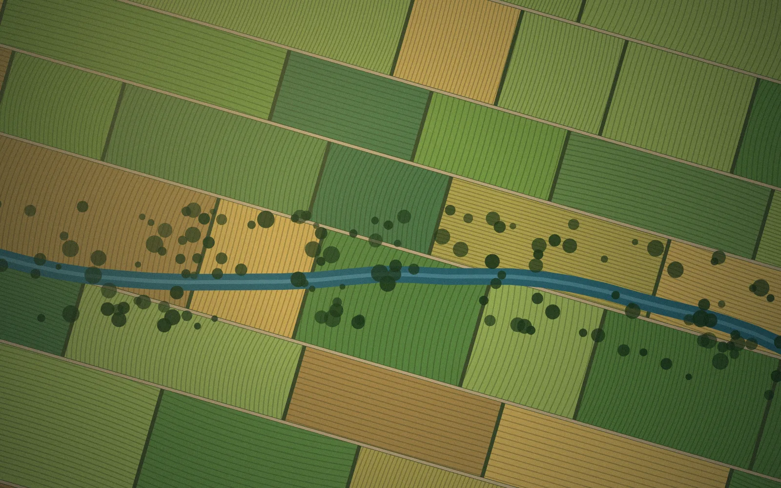 Aerial view of farm parcels and a river